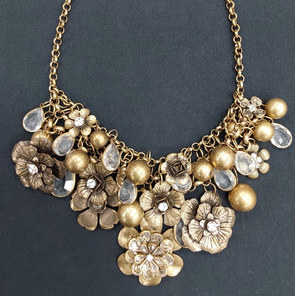 Beautiful Brass Colored Flowers, Crystals, and Rhinestone Necklace 24" long.